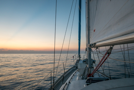 Landscape of croatian islands through a sailing boat during summerの写真素材