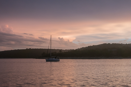 Landscape of croatian islands through a sailing boat during summerの写真素材