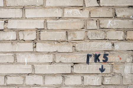 Wall pattern of the ancient structure of buildings in a city. Geometrical and minimalist design.の写真素材
