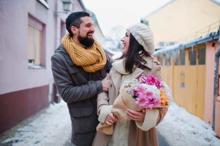 Couple stand on street