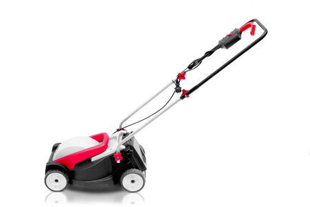 New lawn mower isolated on a white backgroundの写真素材