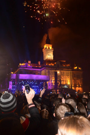 People holding their smartphones and photographing concertの写真素材