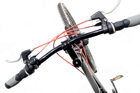 Handbar of a mountain bike isolated on a white backgroundの写真素材