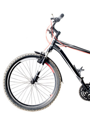 Black bicycle isolated on a white backgroundの写真素材
