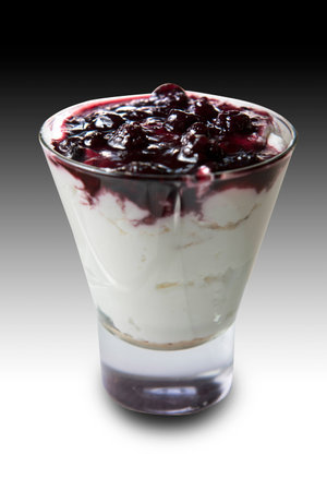 Refreshing cheesecake in a restaurantの写真素材