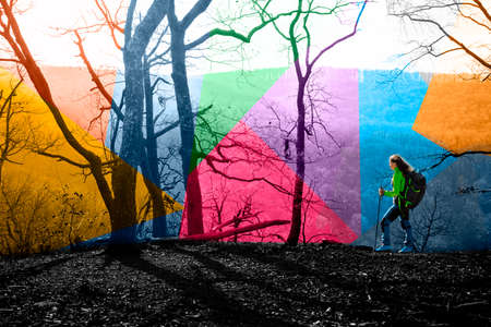 Female in nature outlined with a neon triangleの写真素材