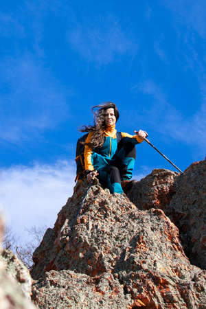Female taking a break during her outdoor activitiesの写真素材