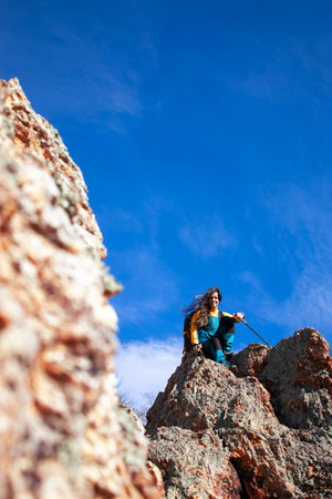 Relaxing on a rock after all day of trekkingの写真素材