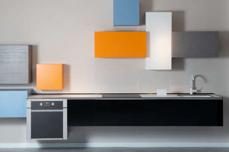 Minimalistic, lively and modern kitchen in a expensive flatの写真素材
