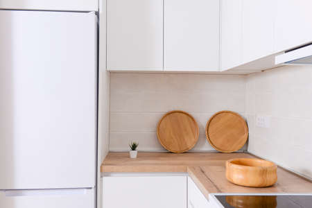 Luxurious and modern kitchen with wooden tablesの写真素材