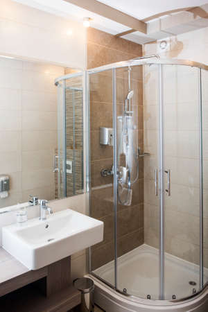Modern bathroom interior with shower and sinkの写真素材