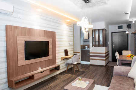 Cozy modern living room with smart appliancesの写真素材