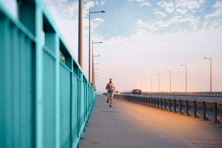 Outdoor jogging during a beautiful and warm spring dayの写真素材