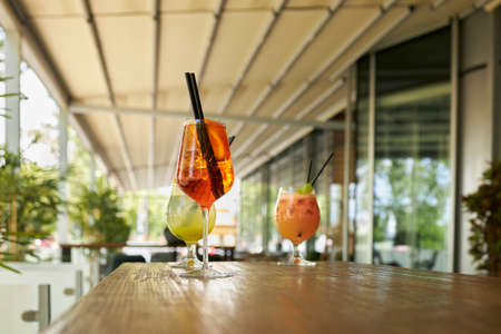Refreshing cocktails in an open bar terraceの写真素材