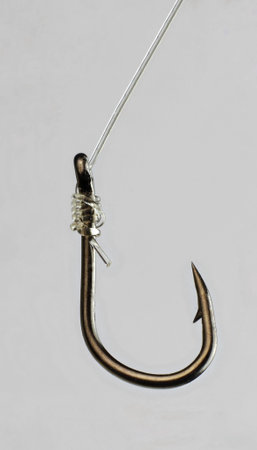Stainless steel fishing hook isolated on white