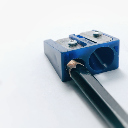 Back to school - frame of Pensil isolated on white background. Drawing supplies: black Pencil, isolated on white background. Pensil on the table. Pensil on white background. If you want back to school - this Pensil for you.の写真素材