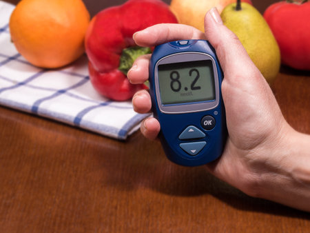 Diabetes checking blood sugar level. Woman using lancelet and glucometer at home.