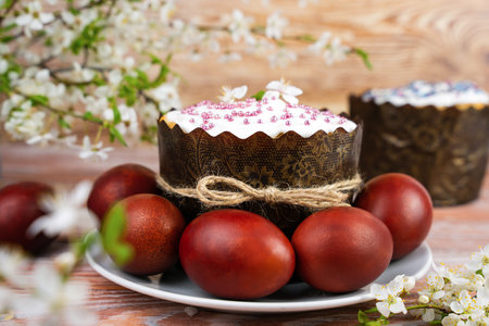 Spring Easter composition with Easter cake and colored eggs on the table. Festive Easter card....