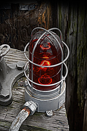 Red Electric Warning Light or beacon is attached to the edge of a pier or dock along the Seattle...