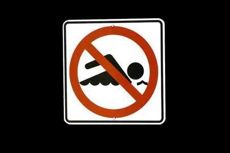 Isolated No Swimming Sign on a black backgroundの写真素材
