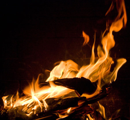Flames of Fire in a fireplace.