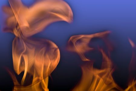 Flames of Fire Abstract on Blue Black Background の写真素材
