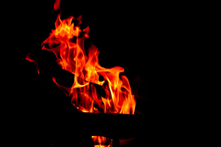 Flames of Fire in a fireplace.