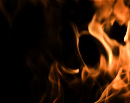 Red Fire Flames of Hell against a black background.の写真素材