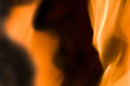 Flames of Fire in a Fireplace against a black Background 
