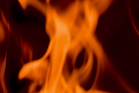 Flames of Fire in a Fireplace against a black Background 