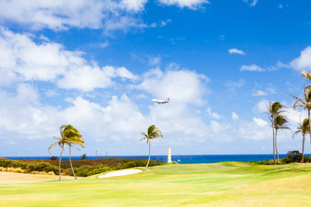 June 2012: Kawaii Island and Hawaiian Airlines plane is landingのeditorial素材