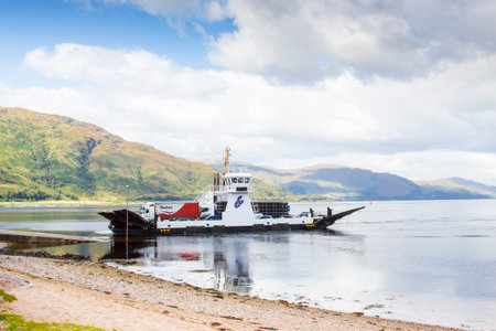 Skye Island August 2014: With this ferry, in August, tourists can land directly in the north of the island where they can find the most amazing Scottish landscapes.のeditorial素材