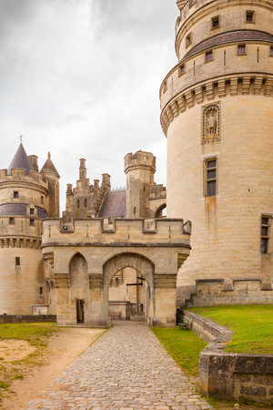 September 2012- In September a lot of tourist visit the Medieval Castel  of  Pierrefond in the north of Paris in France restored by Viollet-le-Duc to enjoy its architecture. Main Entrance view.のeditorial素材