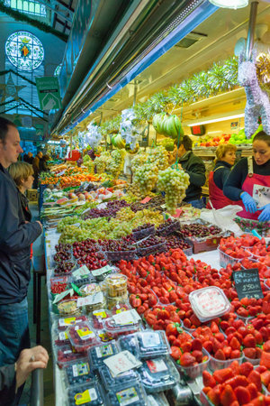 Valencia December 2013 Central Market of Valencia. This food market in the center of Valencia is the largest market of Europe devoted to the specialty of fresh produce, this is why a lot of people come here to buy or eat fresh season foodのeditorial素材