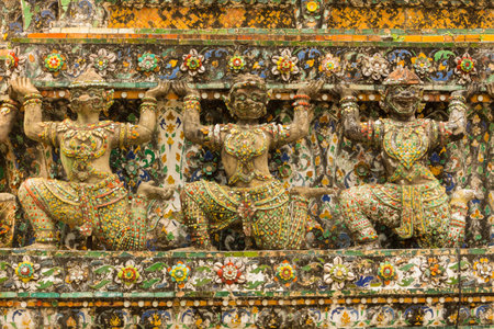 Bangkok January  2013 Detail of the Arun Temple in Bangkok , visited by many tourists in this period,  as the first light of the morning reflects off the surface of the temple with pearly iridescence.のeditorial素材