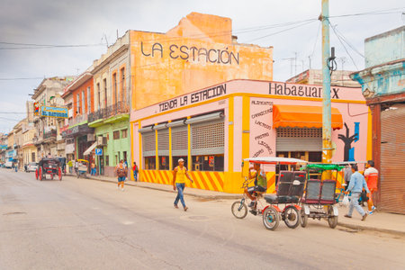 Havana February 2012 In the streets of the capital, in addition to cars, tourists use horse-drawn carriages and tuk tuk to enjoy a slow ride.のeditorial素材