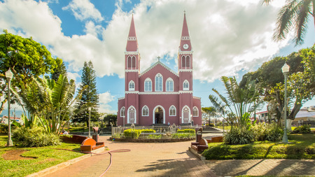 Costa Rica January 2015 tourists visit this neogothic building entirely built in iron for its particular architecture. It is located in the village called Greece a few kilometers from the capitalの写真素材