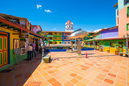 Guatape January 2018 Tourists stroll the streets of Guatape famous for the square and its colorful houses.のeditorial素材