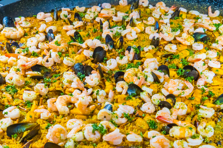 detail of the famous Spanish dish called Paella made with rice vegetables and seafood Medellin Colombiaの写真素材