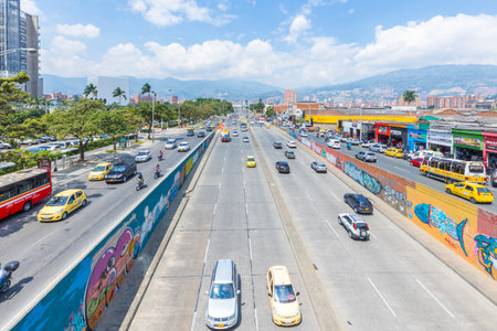 Medellin February 2018 This is the 44th national road that crosses the center of Medellin, always full of cars and trucks because it is an important street of the city.のeditorial素材