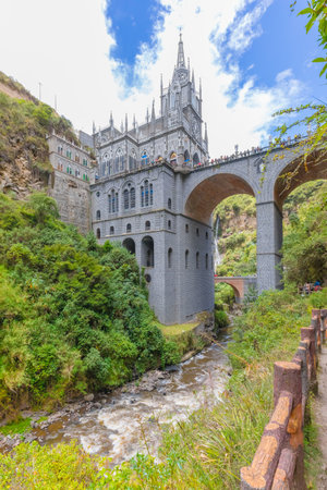 Ipiales Colombia March 2018 Lateral view of Las Lajas Sanctuary in Ipiales South of Colombia. It is a place of worship and pilgrimage visited by many people even for its location in the Guaitara River canyon.のeditorial素材