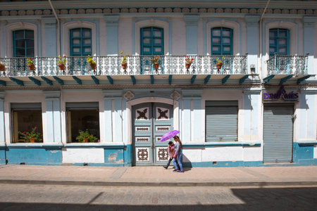 Ecuador May 2018 Walking in the historic center of Cuenca in a sunny day.のeditorial素材