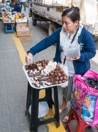 Peru July 2018 One of the many stalls of chocolate, typical product of the Peru. Candies and chocolate never miss walking the streets of Limaのeditorial素材