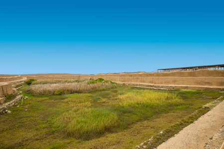 Peru July 2018 Ancient basin of a scared lake in Chan Chan, an archaeological site dates back to 50  700 AD. On the site the archaeologists are still workingのeditorial素材