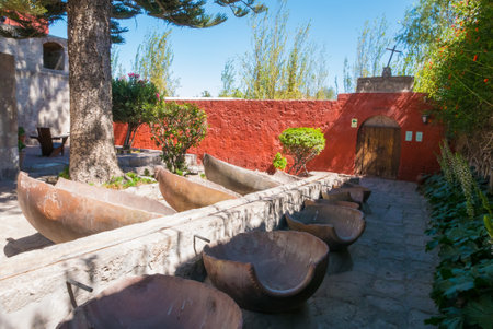 Arequipa Peru August 2018 in this laundry of Santa Catalina monastery, the nuns  assistants came to wash the linen. By closing the central channel at a tank with a stone, the water diverted into the container.のeditorial素材