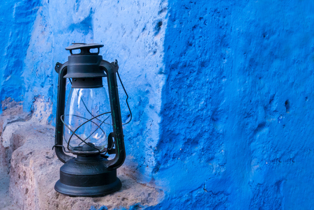 ancient oil lantern in a colonial buidingの写真素材