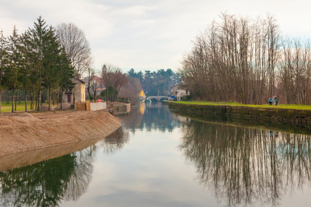 Milano Italy January 6 2014 Along the banks of this canal near Milan city, the inhabitants practice biking and runningのeditorial素材