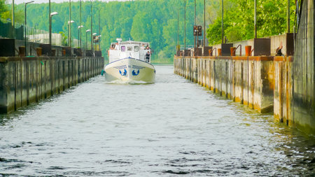 Mantua Italy May 1 2011 a motorboat crosses the channel of the river Mincio that leads to the Vallazza nature reserveのeditorial素材