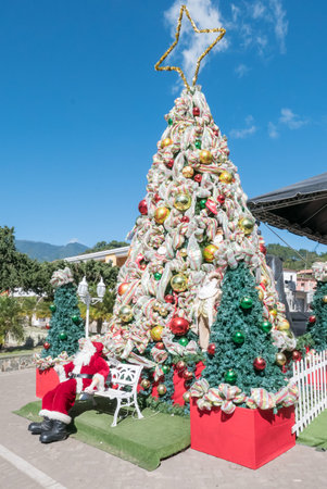 Boquete Panama December 16 2018 In the center of Boquete town Christmas decorations are set up near with Santa Claus waiting for children and their wishes.のeditorial素材