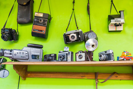 Bogota, Colombia March 06  These old cameras and videocameras are exhibited in a restaurants of  Bogota reminding clients the old way to take photos and videos. Shoot on March 06, 2019のeditorial素材